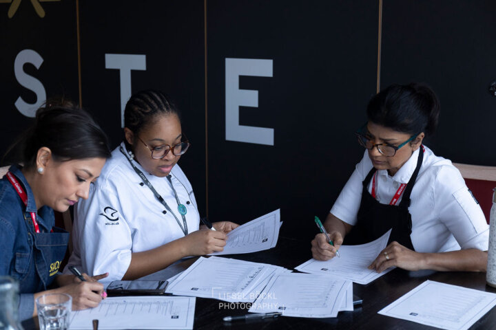 Aida Khan, Kyla Bertrand and Aida Khan marking the quiz - Indian Spice Masterclass - West London College